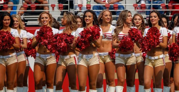 NFL cheerleader kneels during national anthem 