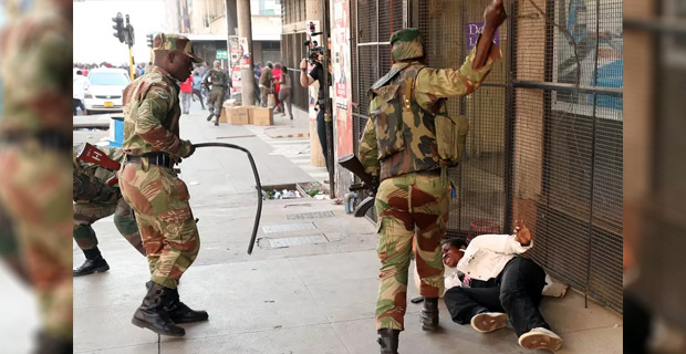 Three dead after troops opened fire on rioting opposition supporters in Zimbabwe