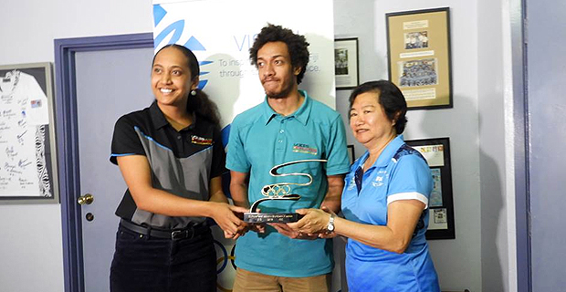 Voices of the Athletes program receive trophy from International Olympics Committee