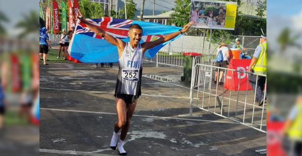 Avikash Lal wins gold for Fiji during the half marathon event at the Pacific Games
