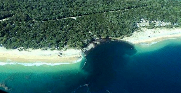 Large section of an Australian beach falls into the ocean due to erosion