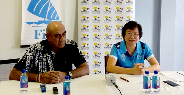 Paradise Beverages hands over $10000 in sponsorship to FASANOC