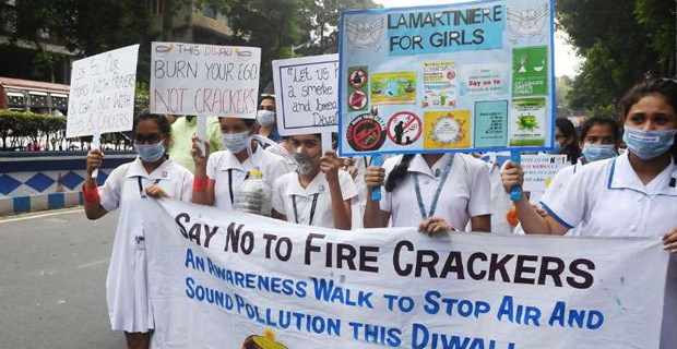 People scramble to buy air purifiers and protest the use of firecrackers for Diwali in New Delhi