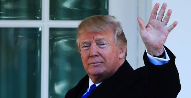 Trump pressures Congress to end a government shutdown that has reached its second day