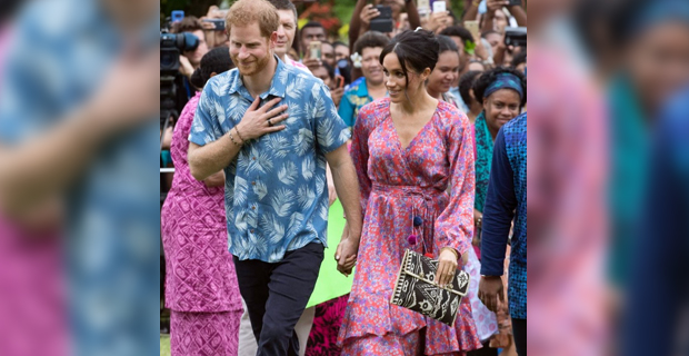 Students of USP line up along roads in USP Laucala Campus awaiting the arrival of the Royal couple