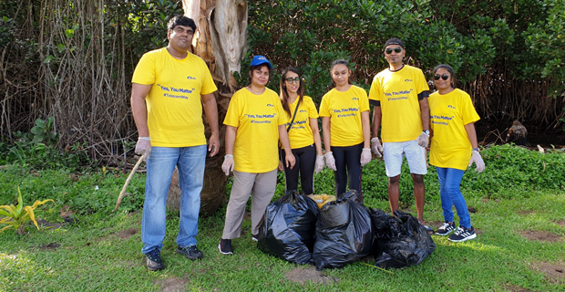 Telecom Fiji staff collect A refrigerator, styrofoam takeaway containers, fuel gallons during Plastic-Free campaign