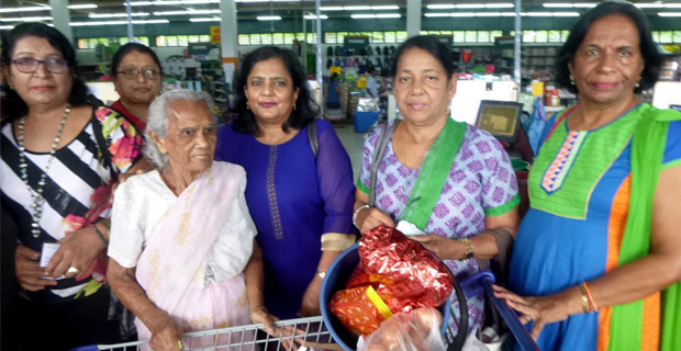 13 people in their 50's get special Diwali hamper packs from Poor Relief Society