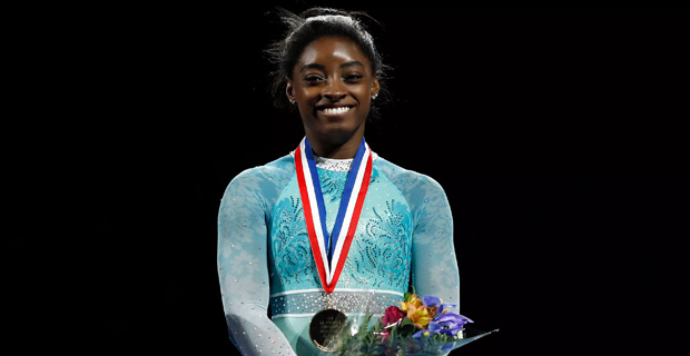 Gymnast wins record 13th world title