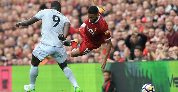 Manchester United holds Liverpool in EPL while Barcelona comes from behind to hold Atletico Madrid  in La Liga