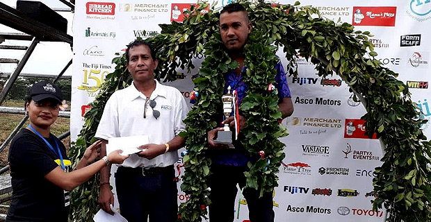 Amlesh Kumar and horse Volcano win the 250M Open Race at the Sabeto Horse Races