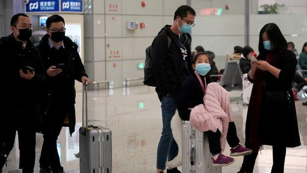 Australia to begin screening passengers arriving from a Chinese city in a bid to stop the new virus spreading