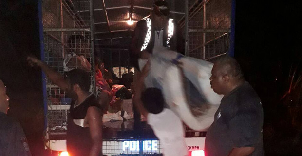 Man dies after being washed away by flood waters, one still missing 