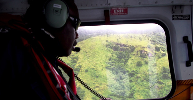 Police use a helicopter to conduct surveillance on drug farms