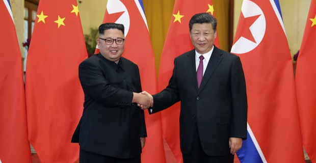 Kim Jong‑un arrives in China for an unannounced visit at President Xi Jinping's invitation