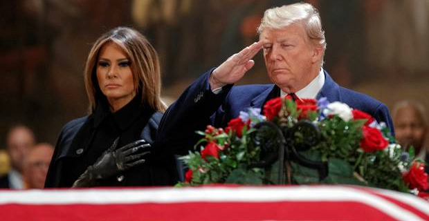 US President and First Lady pay their respects to the late president George H.W. Bush