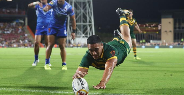 Holmes scores 5 tries to help Australia thump Samoa