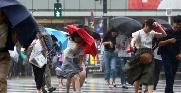 Storm hits central and western Japan injuring at least 21 people