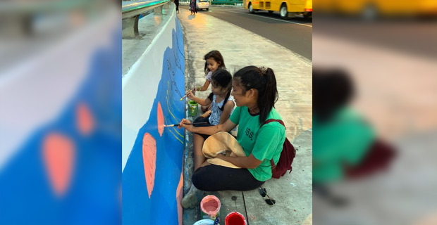 Mural painted by ISS students on Stinson Parade Bridge to raise awareness on climate change