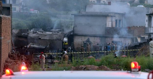 15 people killed after small military plane crashes into residential area in the Pakistan