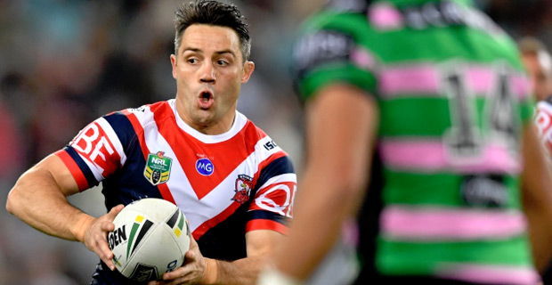 Cronk guides Roosters to the top of the NRL ladder after defeating Rabbitohs 18-14