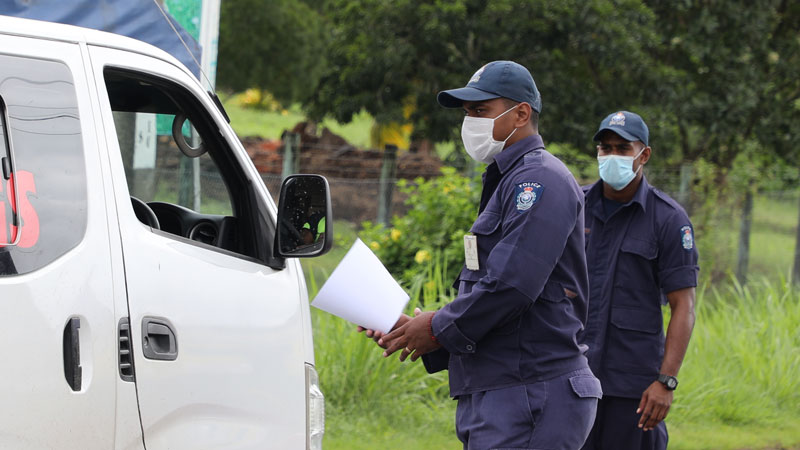 Police turn away a number of vehicles from crossing containment zone borders however some taxis still going through