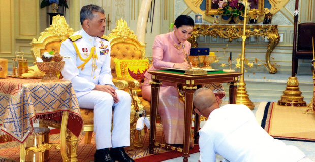 King of Thailand turns head of personal security into a Queen