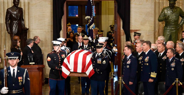 George HW Bush lies in state at US Capitol