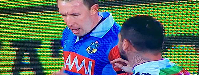 Reynolds charged for touching referee