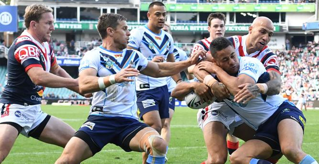 Nakubuwai stretchered from the field as Roosters beat Titans