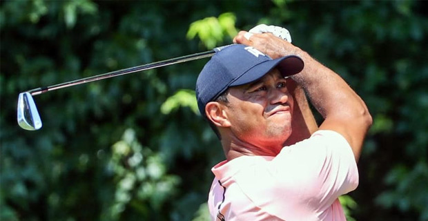 Tiger Woods takes Tour Championship lead