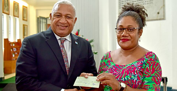 PM hands over cheque of $35,000 to WOWS Kids Fiji