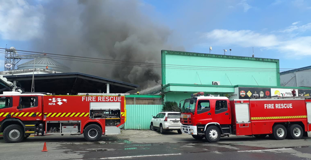 Firefighters contain fire at Paradise Beverages administration building in Walu Bay