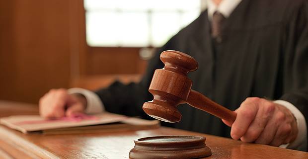 2 former WAF employees pleaded not guilty to corruption related charges