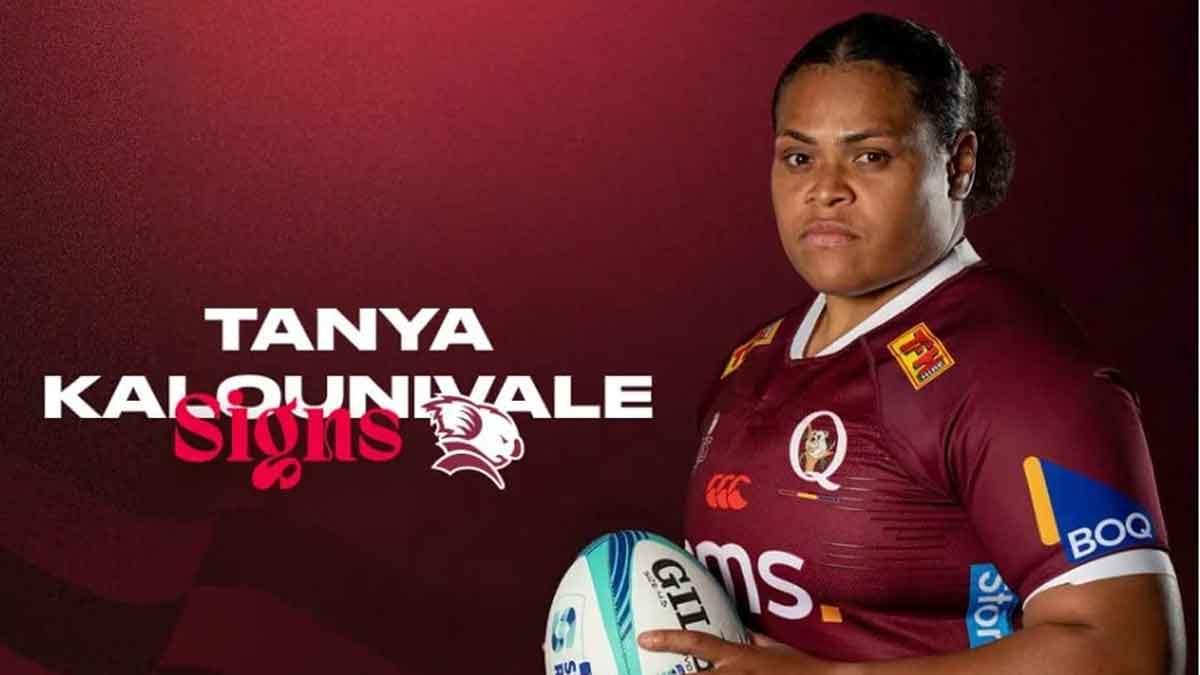 Former Grammar student and Black Ferns prop signs with Reds