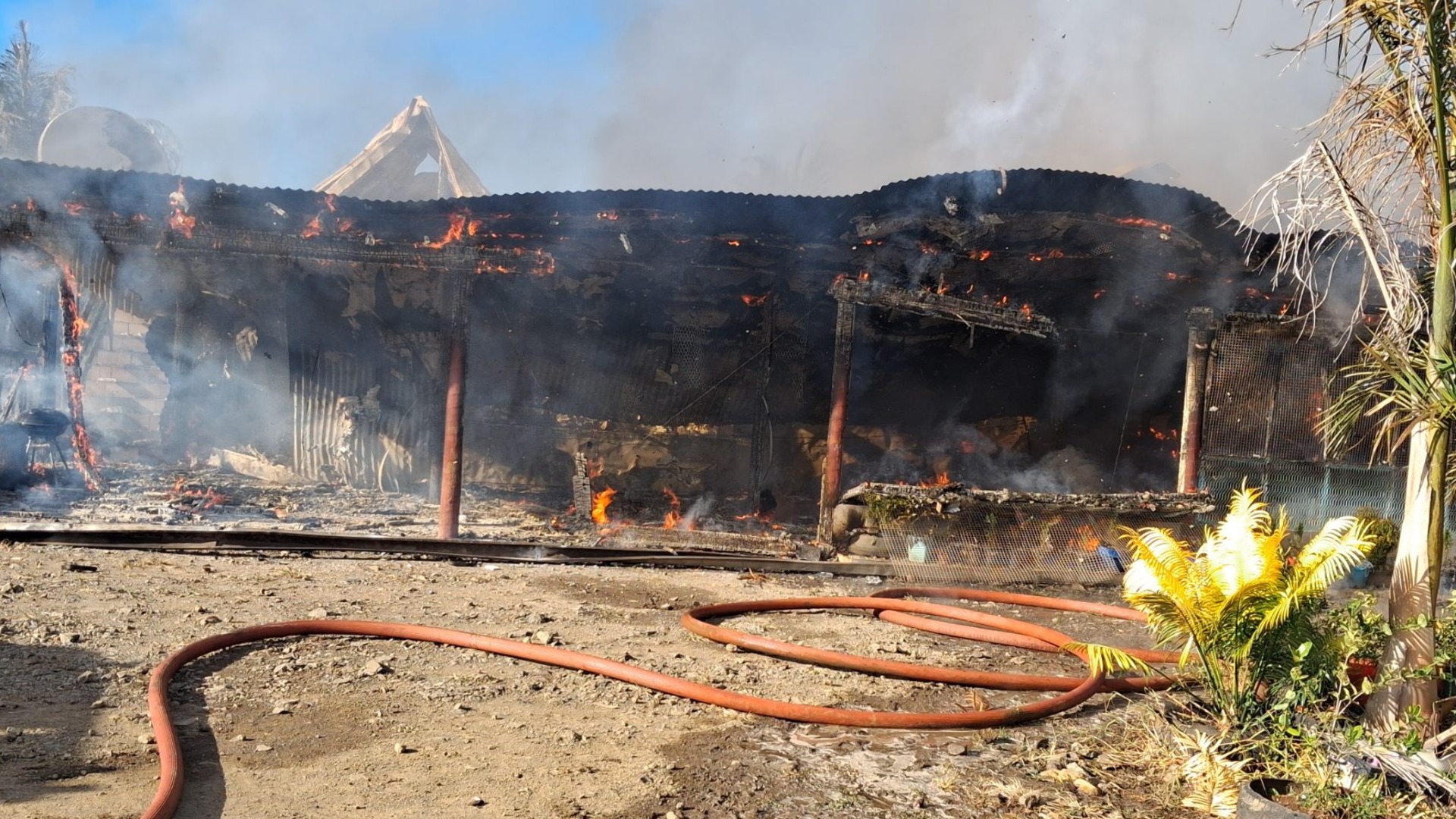 Son escapes safely as fire destroys family home