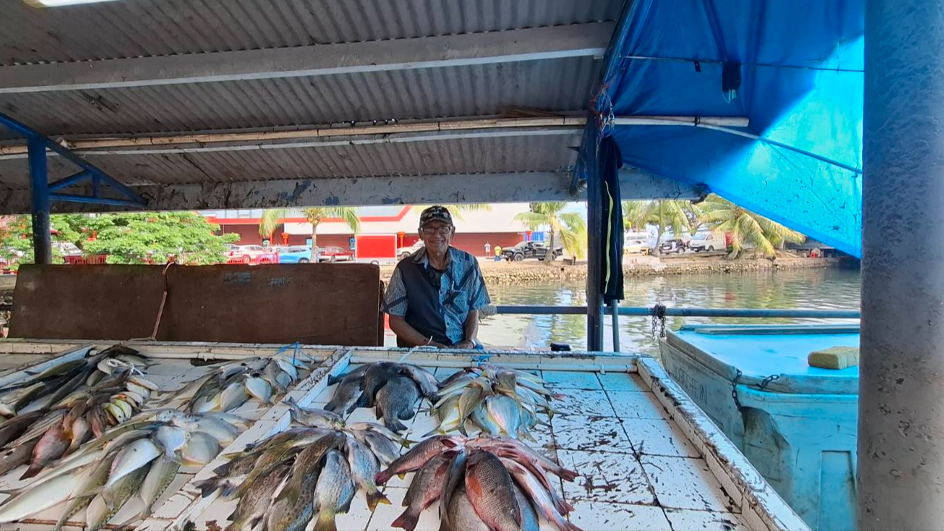 91-year-old fish seller says staying active is the secret to a long life
