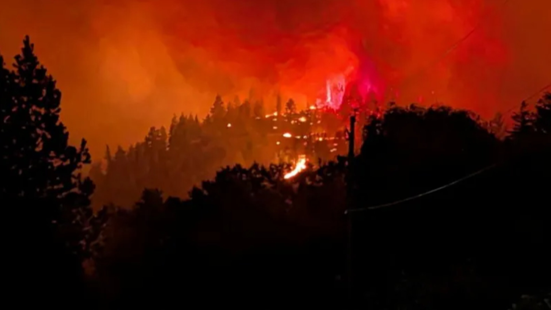 Thousands flee as wildfire doubles in size in western Canada