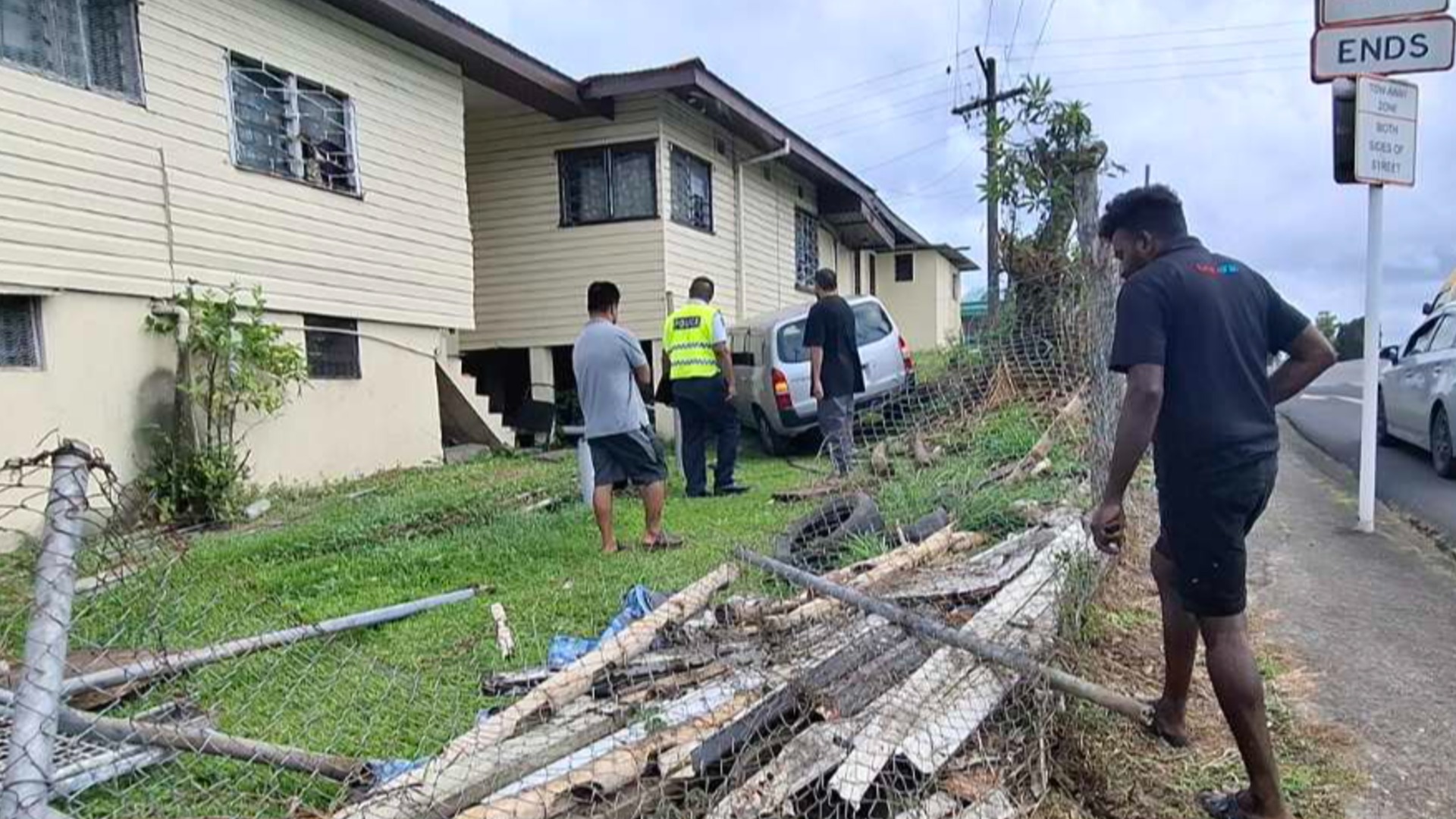 Car veers off Milverton Road and crashes into house compound