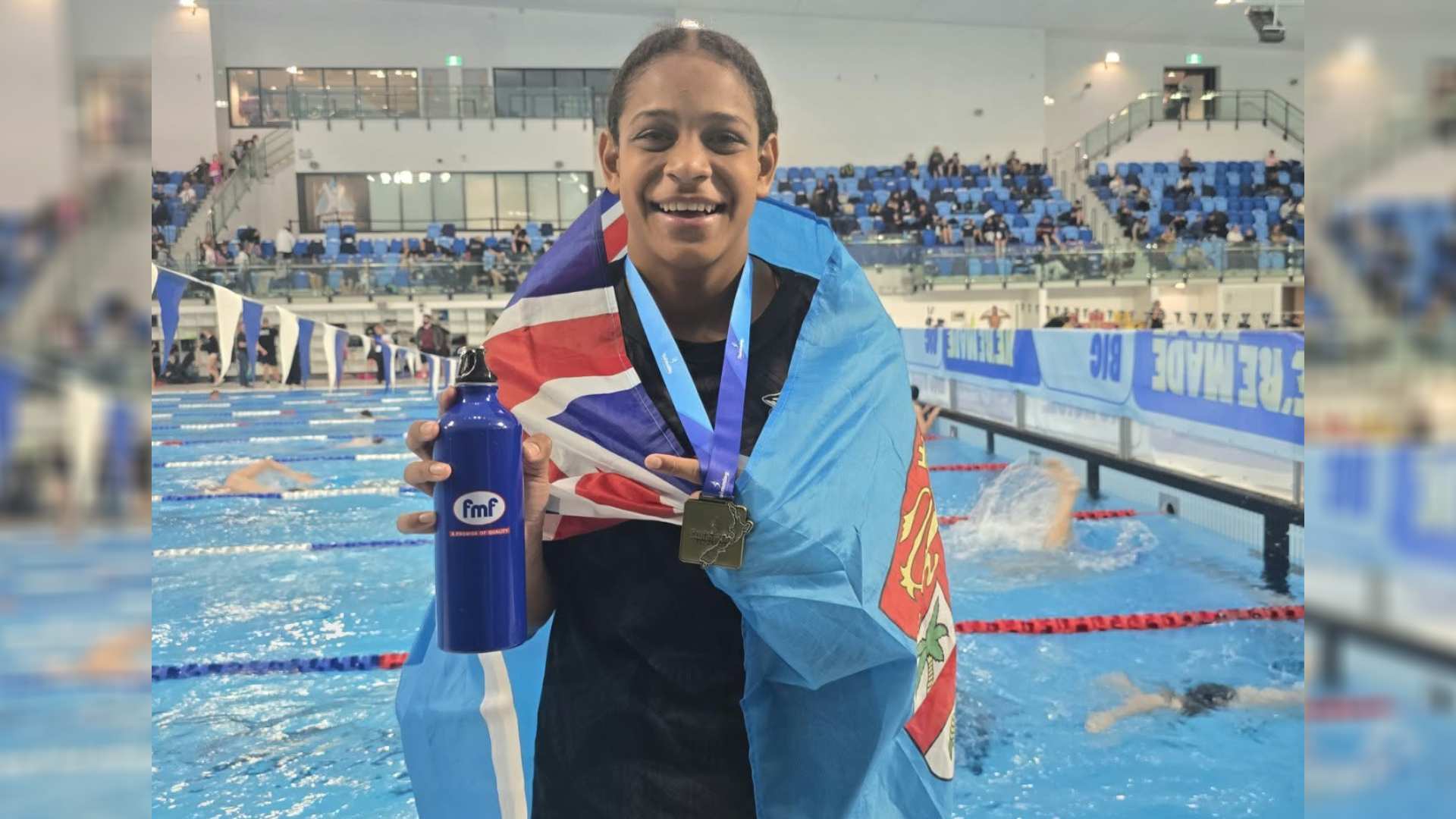 14-year-old Grace Khelan wins 100m freestyle gold at NZ Championships