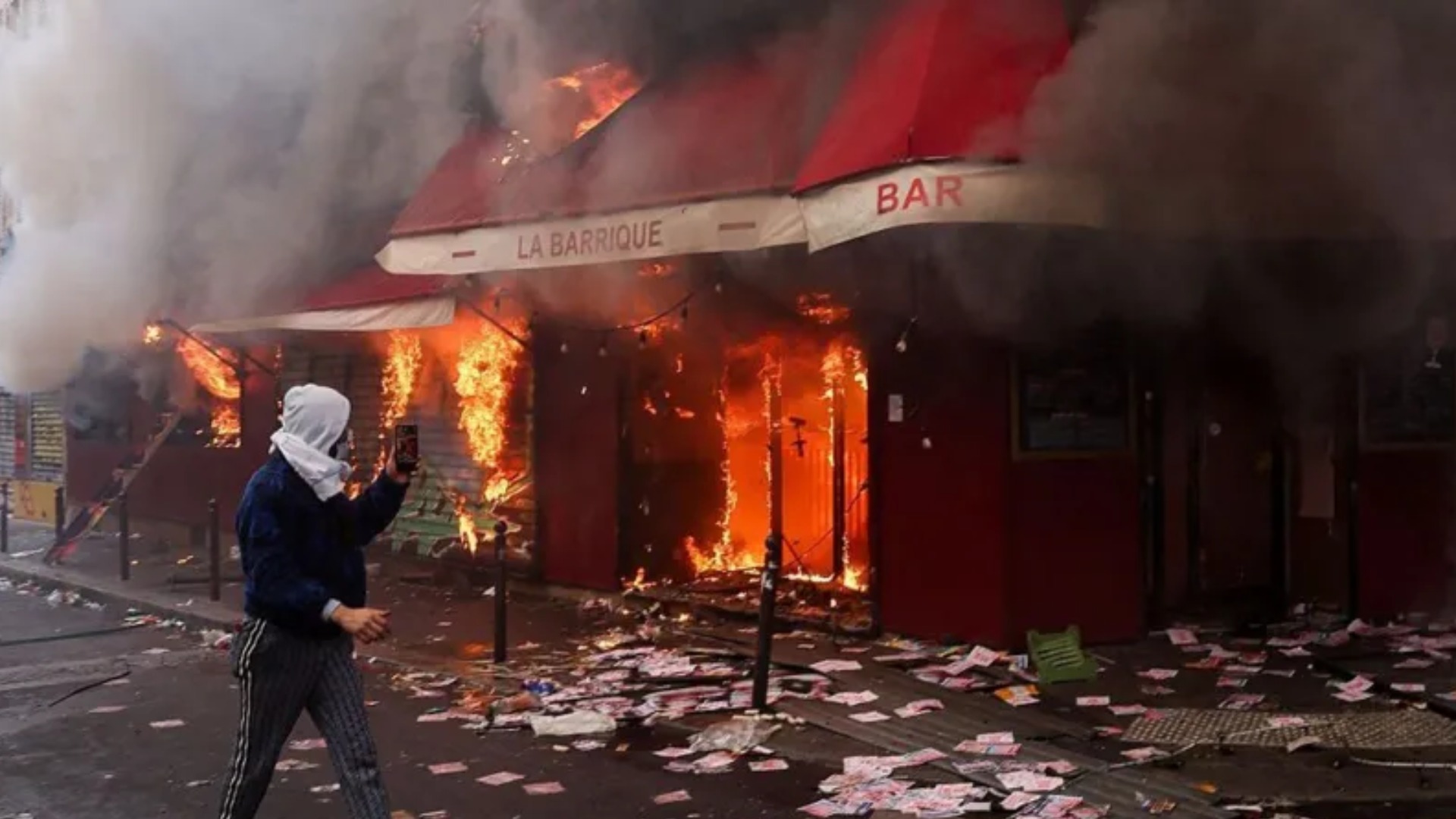 Violent clashes, looting and buildings ablaze in France as over 1,000 arrested after protests