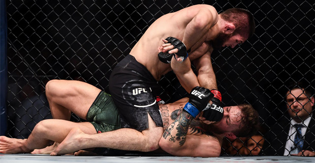 Khabib defeats Conor via 4th round submission 