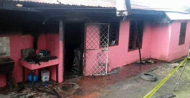 Double storey concrete house partly burnt in Kinoya