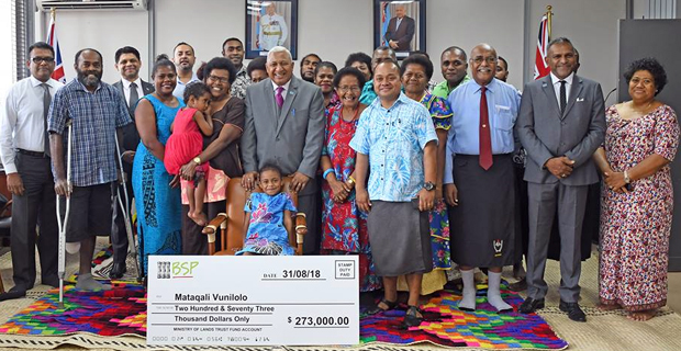 Bainimarama hands over cheque to Mataqali of Vunilolo village to utilise land to extend Nausori Airport