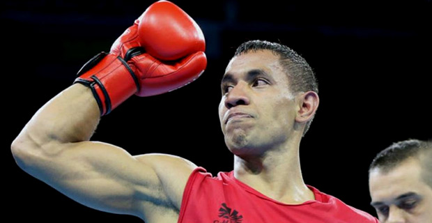  Hill assured of a Commonwealth Games medal after winning his quarter final clash