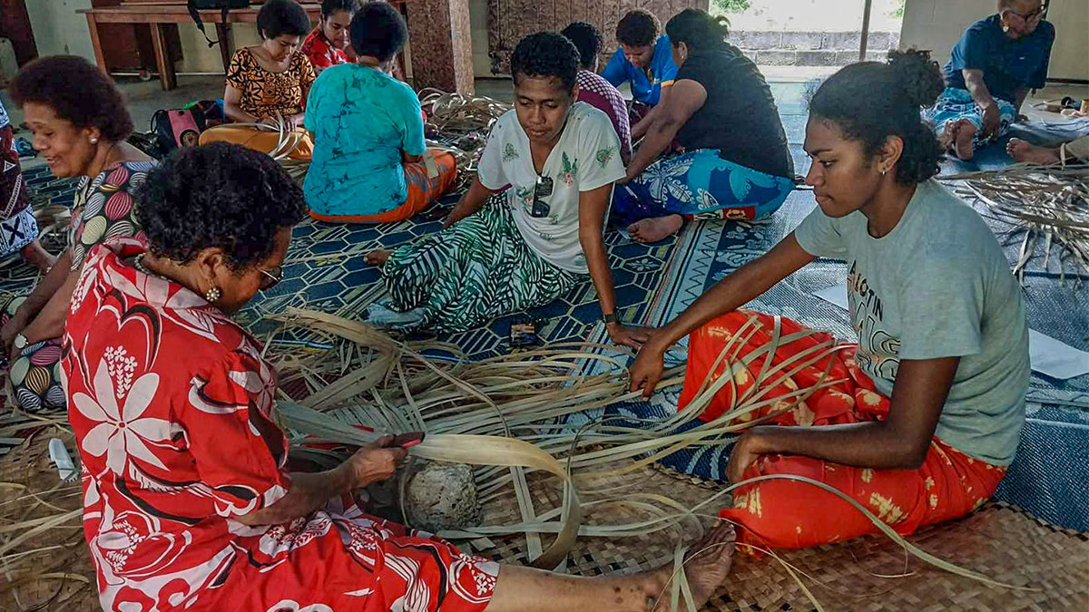 Fiji Pearls learn the art of mat weaving in a team bonding session