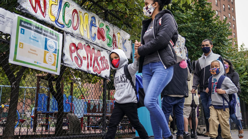 New York City closes all schools amid virus spike