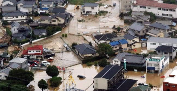 Floods and landslides leave dozens dead and 50 missing in Japan