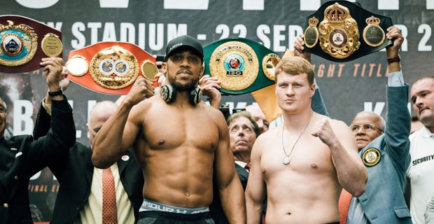 Joshua towers over Povetkin at heavyweight title weigh-in
