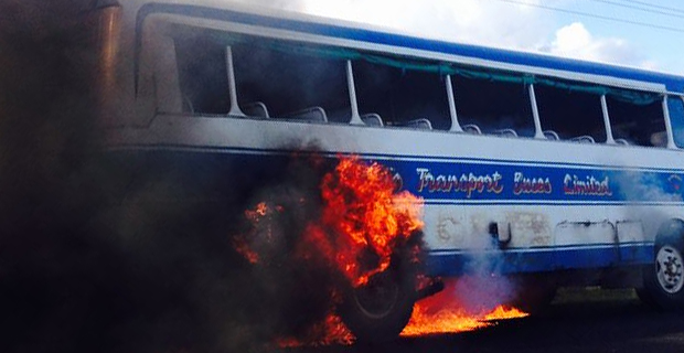 Police and NFA currently investigating cause of a bus fire along the Queens Highway