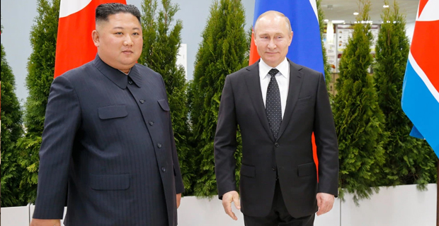 Kim Jong-Un and Vladimir Putin pledge to boost ties